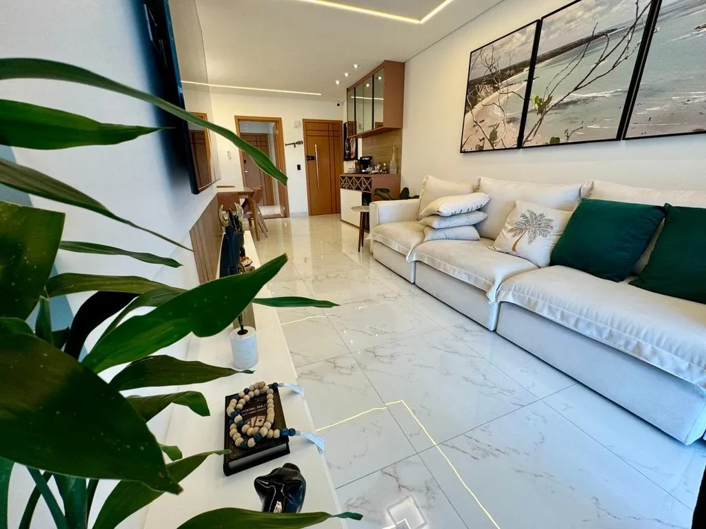 sala 2 ambientes, piso em porcelanato, teto rebaixado e iluminação diferenciada